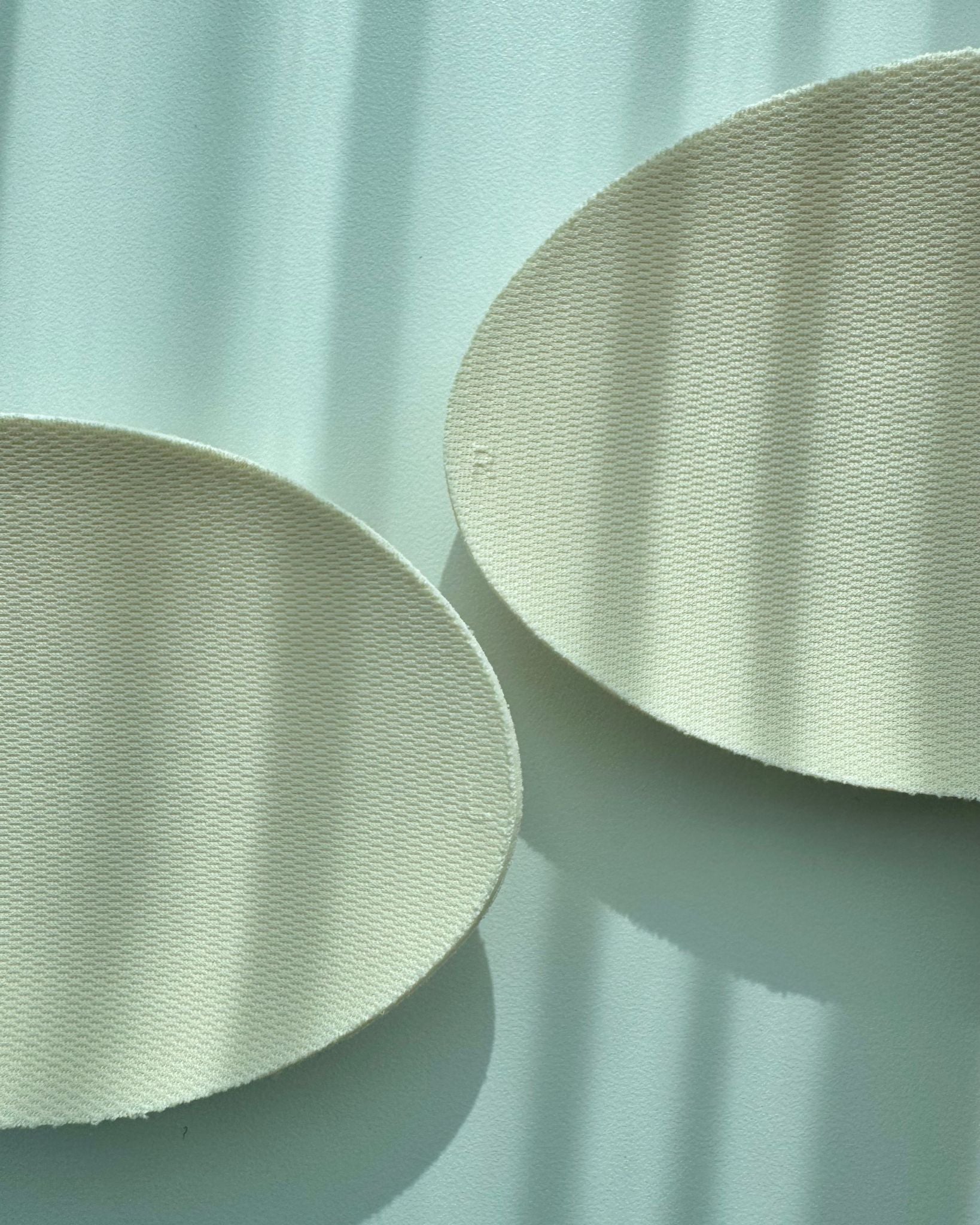 Bra pads with breathable padding for chest protection and comfort